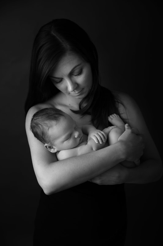 Newborn photography Sidcup, black and white Clare Long photography Kent newborn photographer Mummy cuddles 