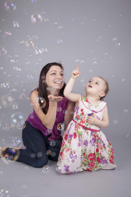 Family photographer London Clare Long Photography Mummy Daughter bubbles