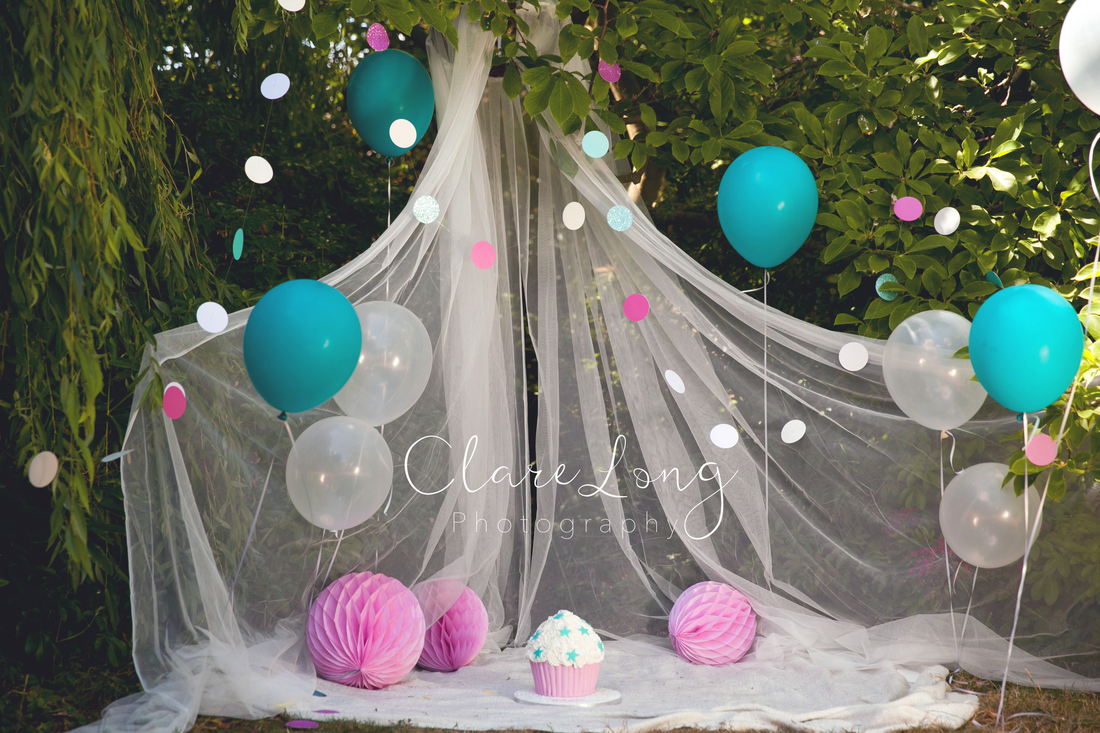 Clare Long Photography Kent photographer handmade set personalised shoot cakesmash outdoors pink and tealPicture