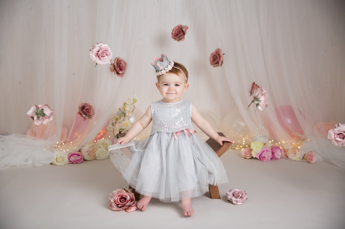 Clare Long photography cake smash pink flowers balloons first birthday london kent