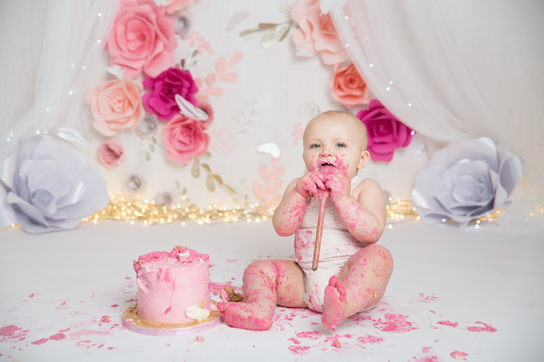 Clare Long photography cake smash pink flowers balloons first birthday london kent