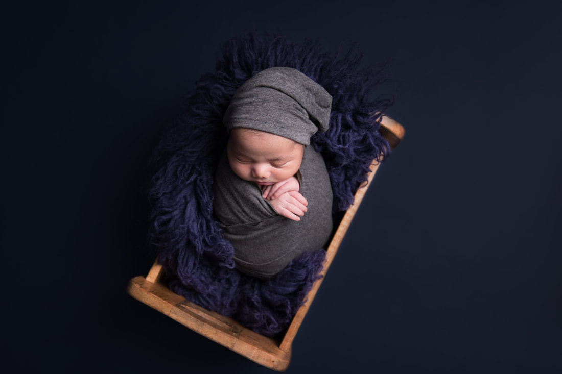 Clare Long Photography Newborn Photographer Kent sleepy newborn