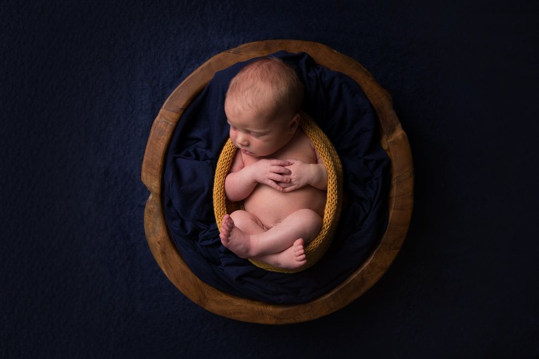 Newborn photography Sidcup Kent Clare Long photography Kent newborn photographer blue and mustard